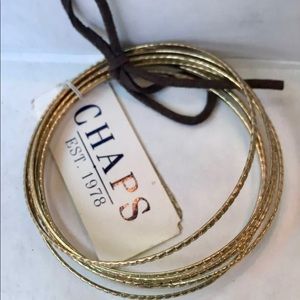CHAPS .Set Of 7 Gold Tone Metal Bangle Bracelets.. New with Tag